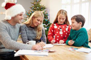Family Writing Christmas Letters Together